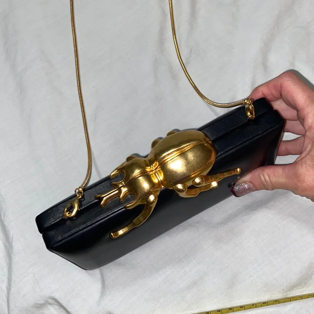 Like new HTF RARE India Hicks “Amulet” golden boy lucky beetle clutch/crossbody